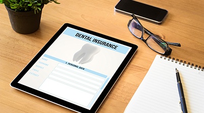 Dental insurance information displayed on electronic tablet